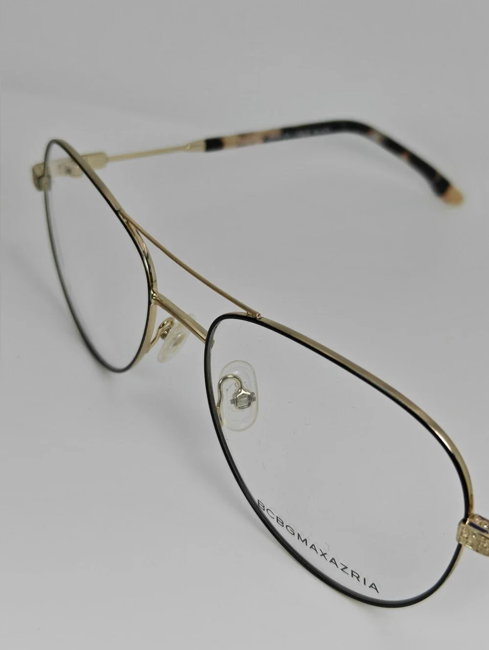 BCBGMAXAZRIA Call Aviator Eyeglass Frames in Black and Gold. Feminine.